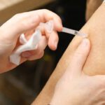 Efeitos colaterais da vacina contra a COVID 19 e maior em