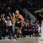 Curry faz mágica, e Warriors vencem Suns em jogaço na NBA